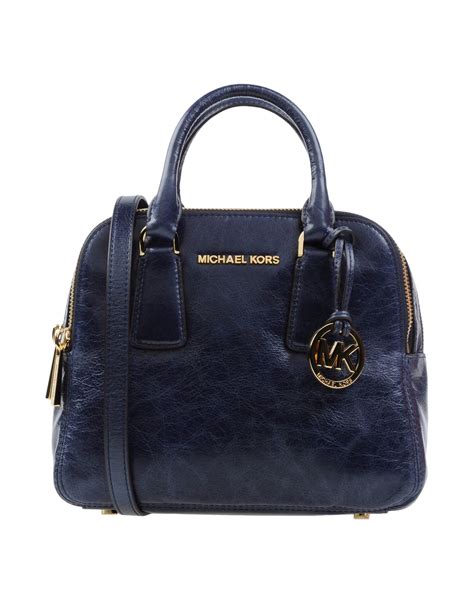 michael kors purse dark blue with spikes|Michael Kors blue crossbody purse.